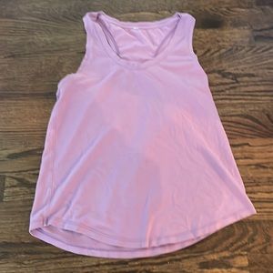 This tank top is from lululemon it is slightly worn and is a size 4.